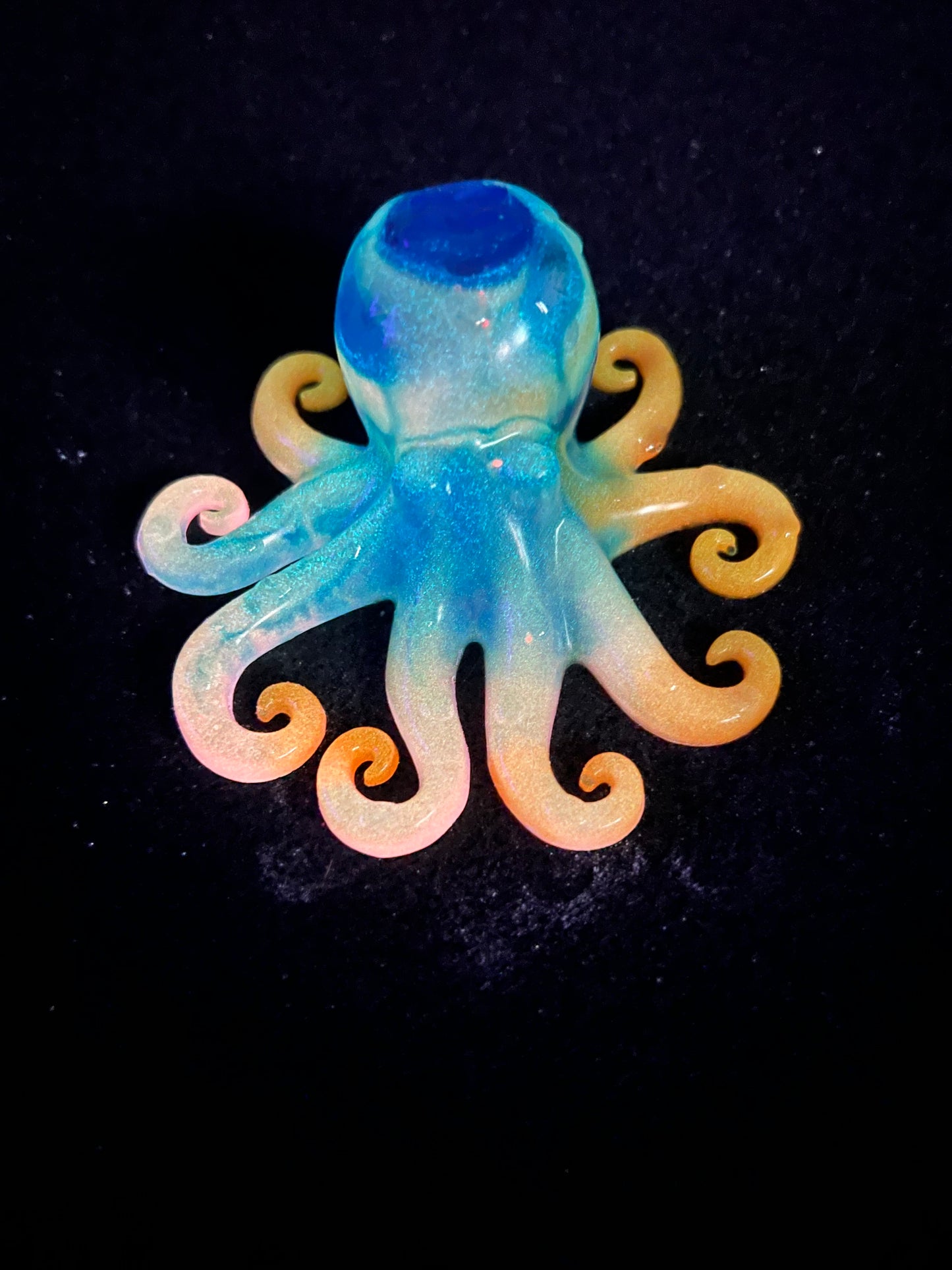 Glow in the dark resin octopus sculpture