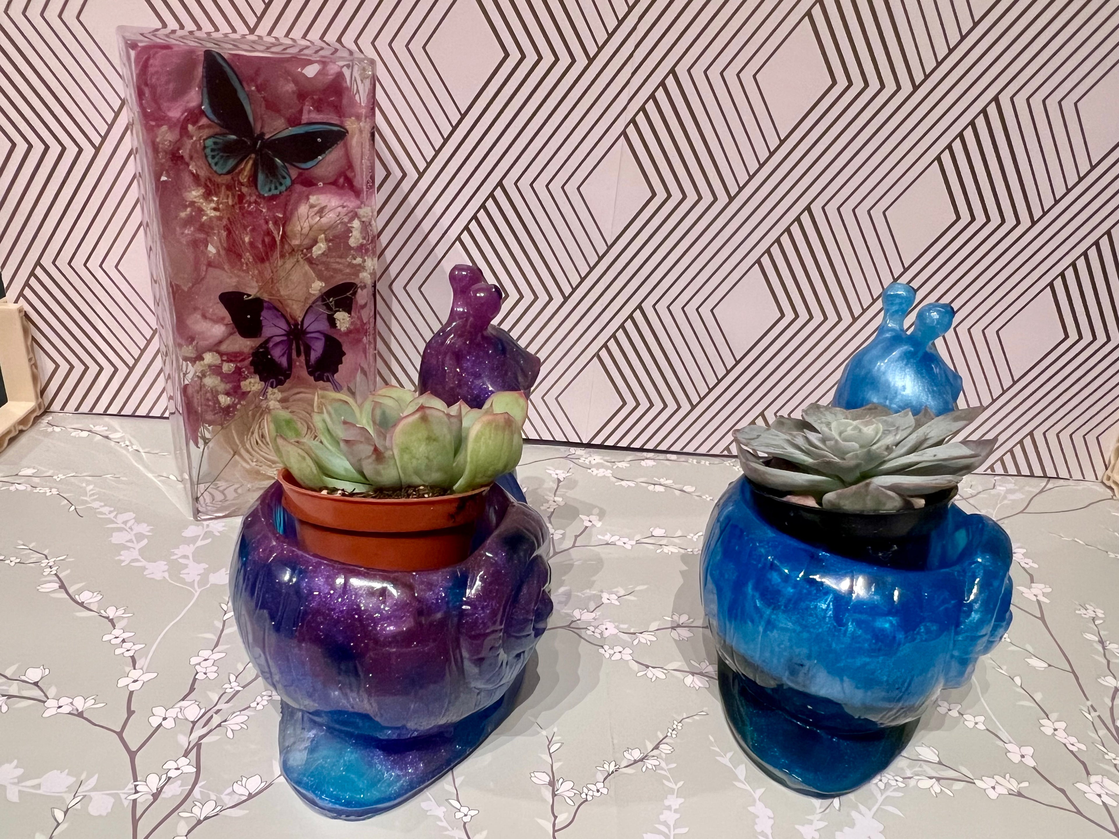 A beautiful resin Snail succulent pot