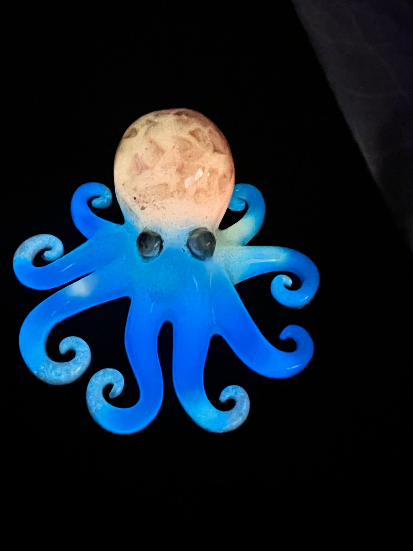 Glow in the dark resin octopus sculpture