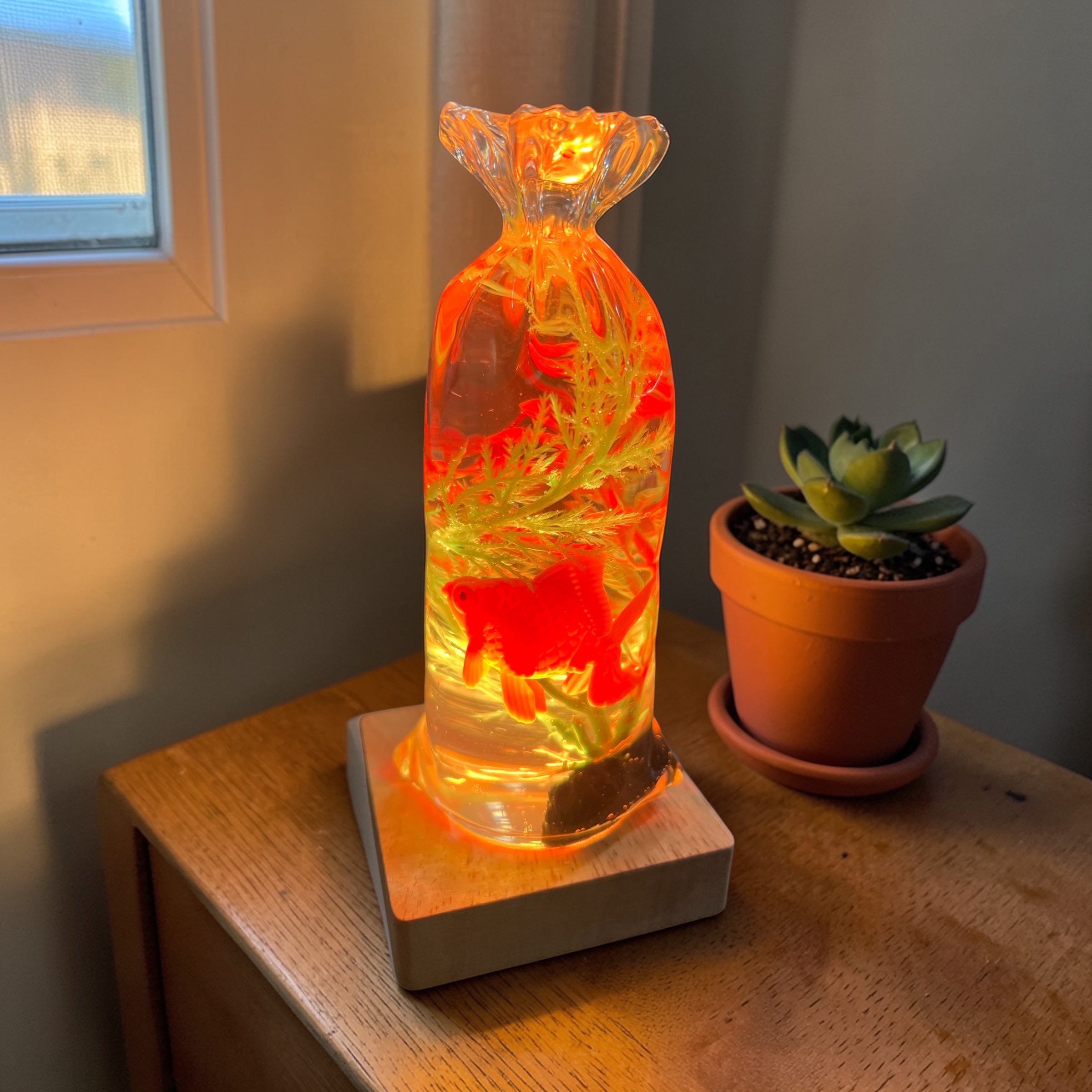 Nostalgic gold fish in a bag night light