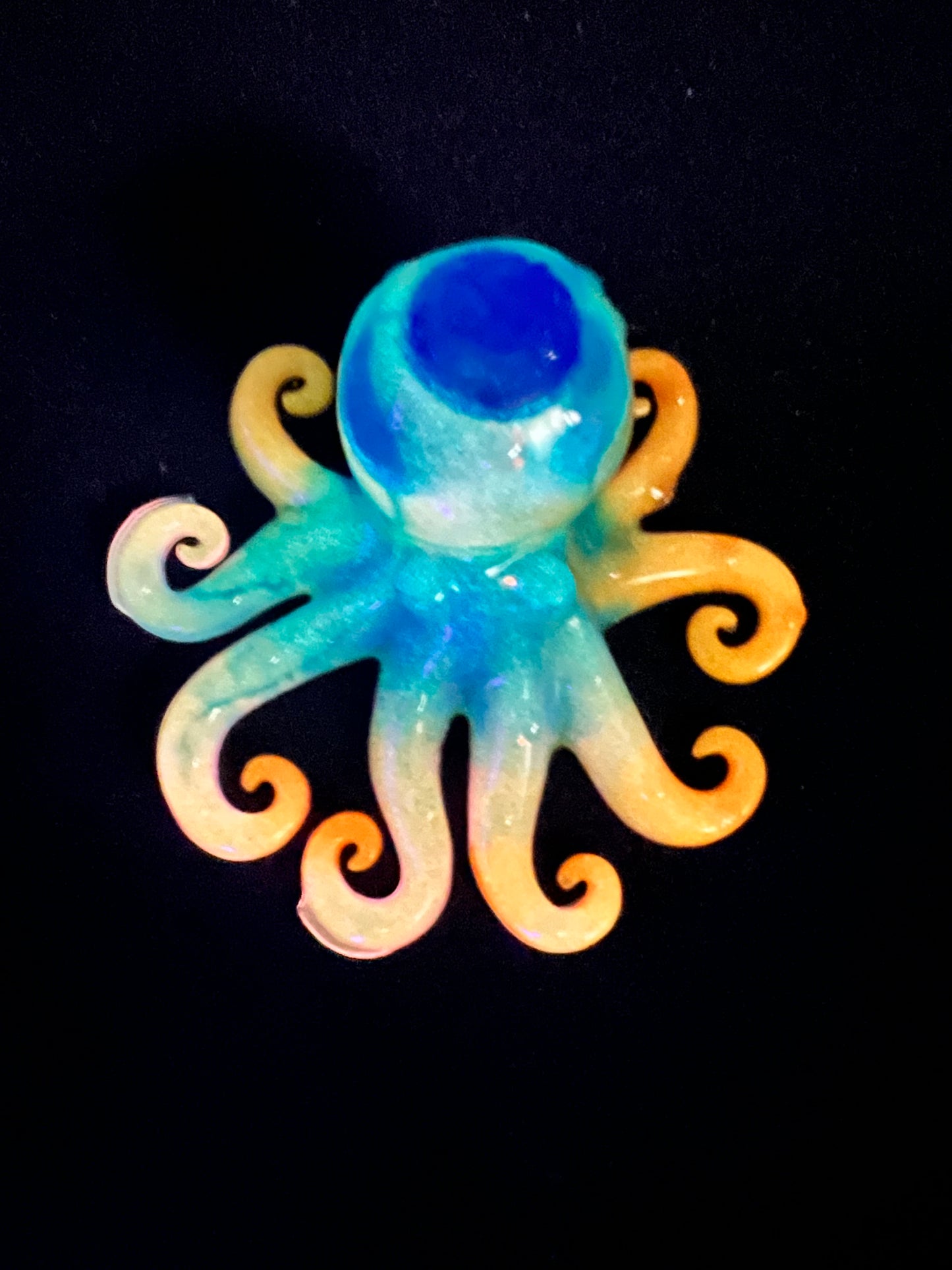 Glow in the dark resin octopus sculpture