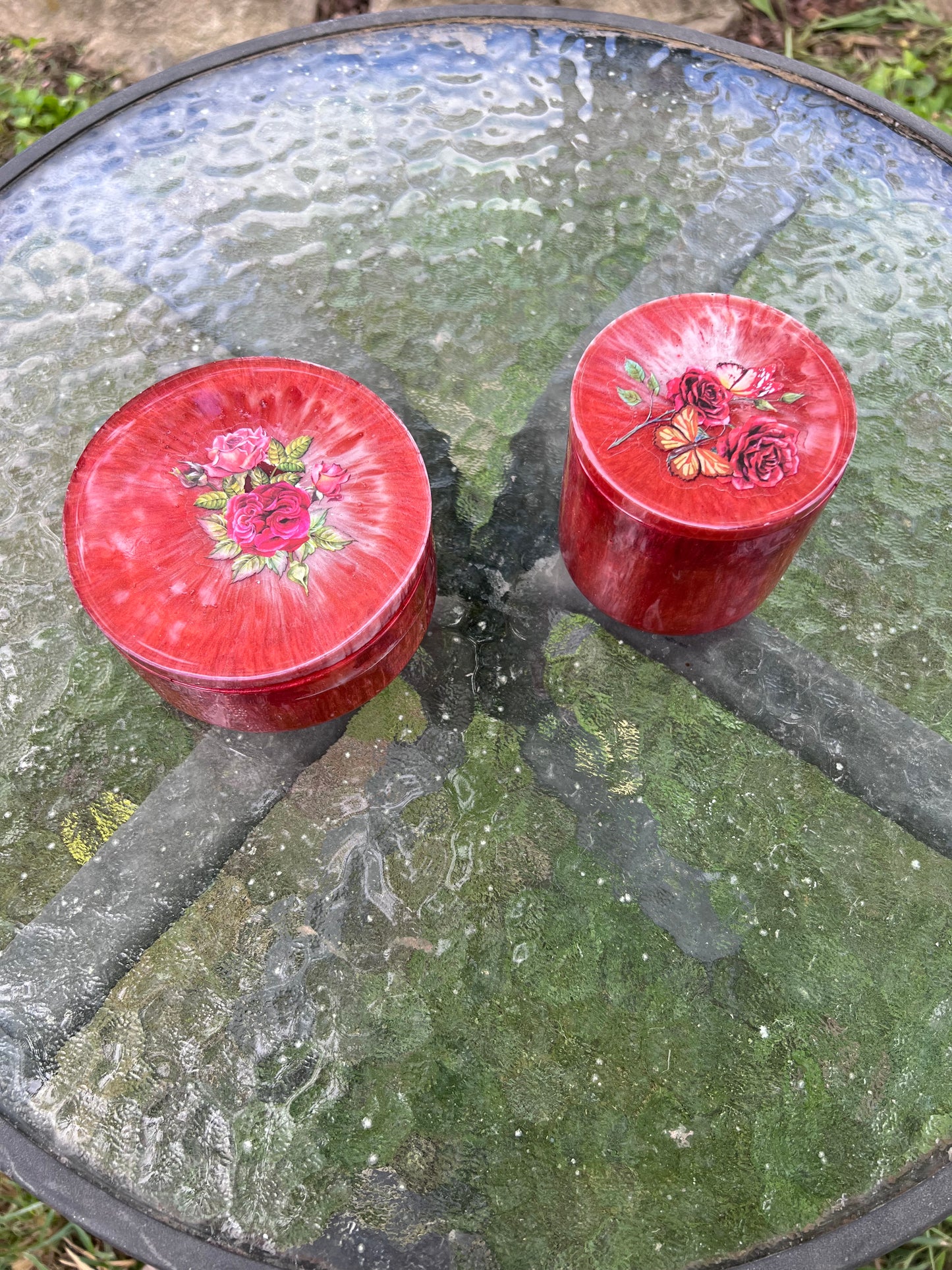 Red resin jar with floral accent