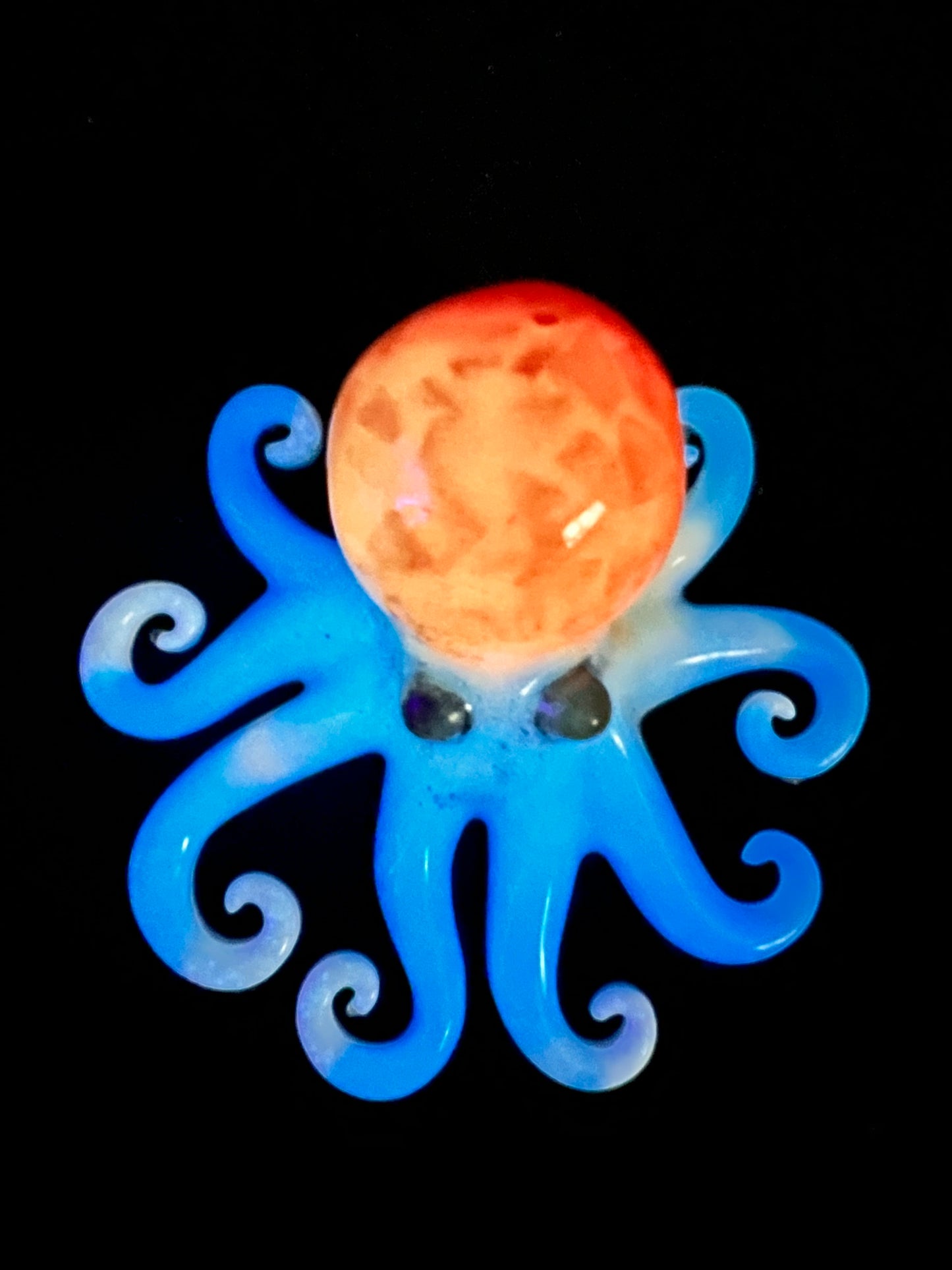 Glow in the dark resin octopus sculpture