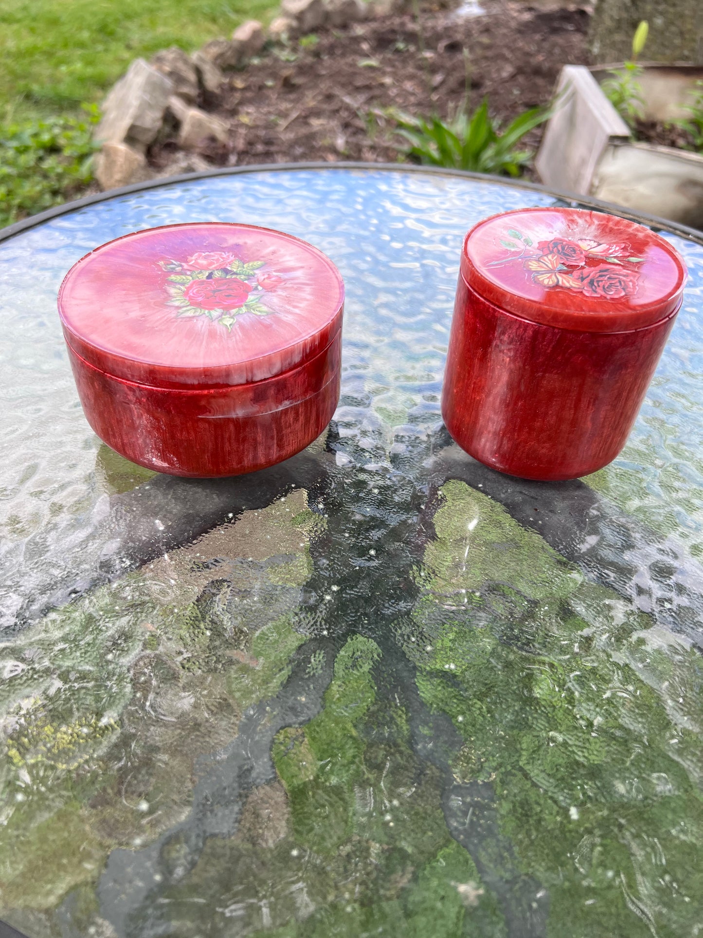 Red resin jar with floral accent