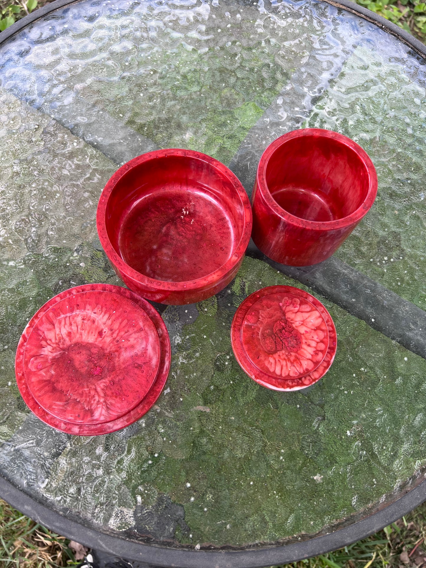 Red resin jar with floral accent