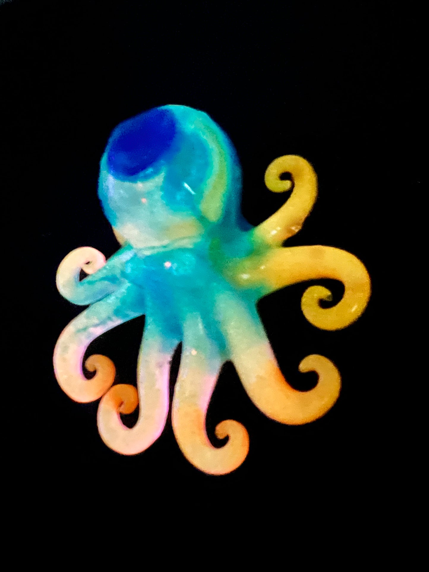 Glow in the dark resin octopus sculpture