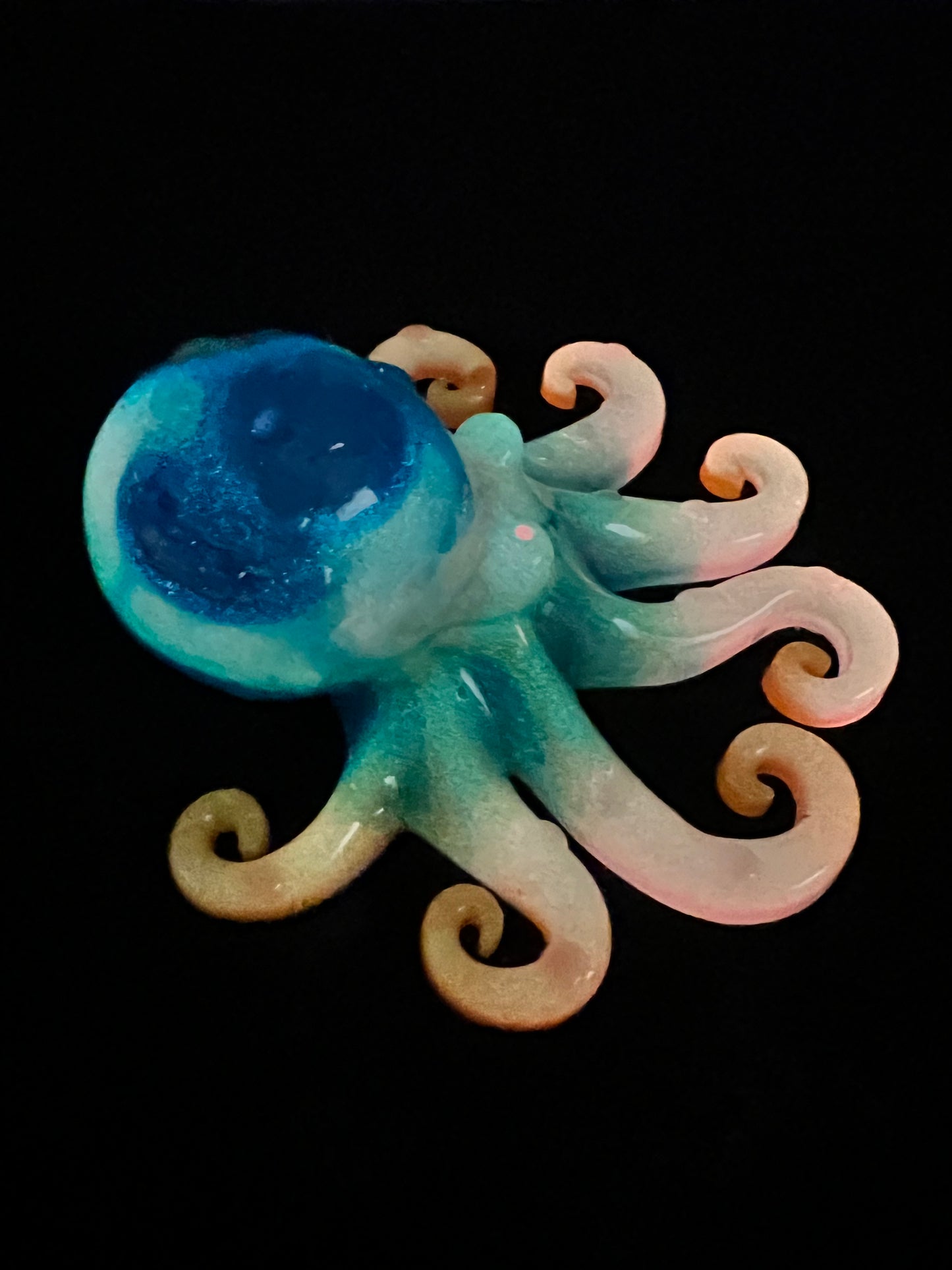 Glow in the dark resin octopus sculpture