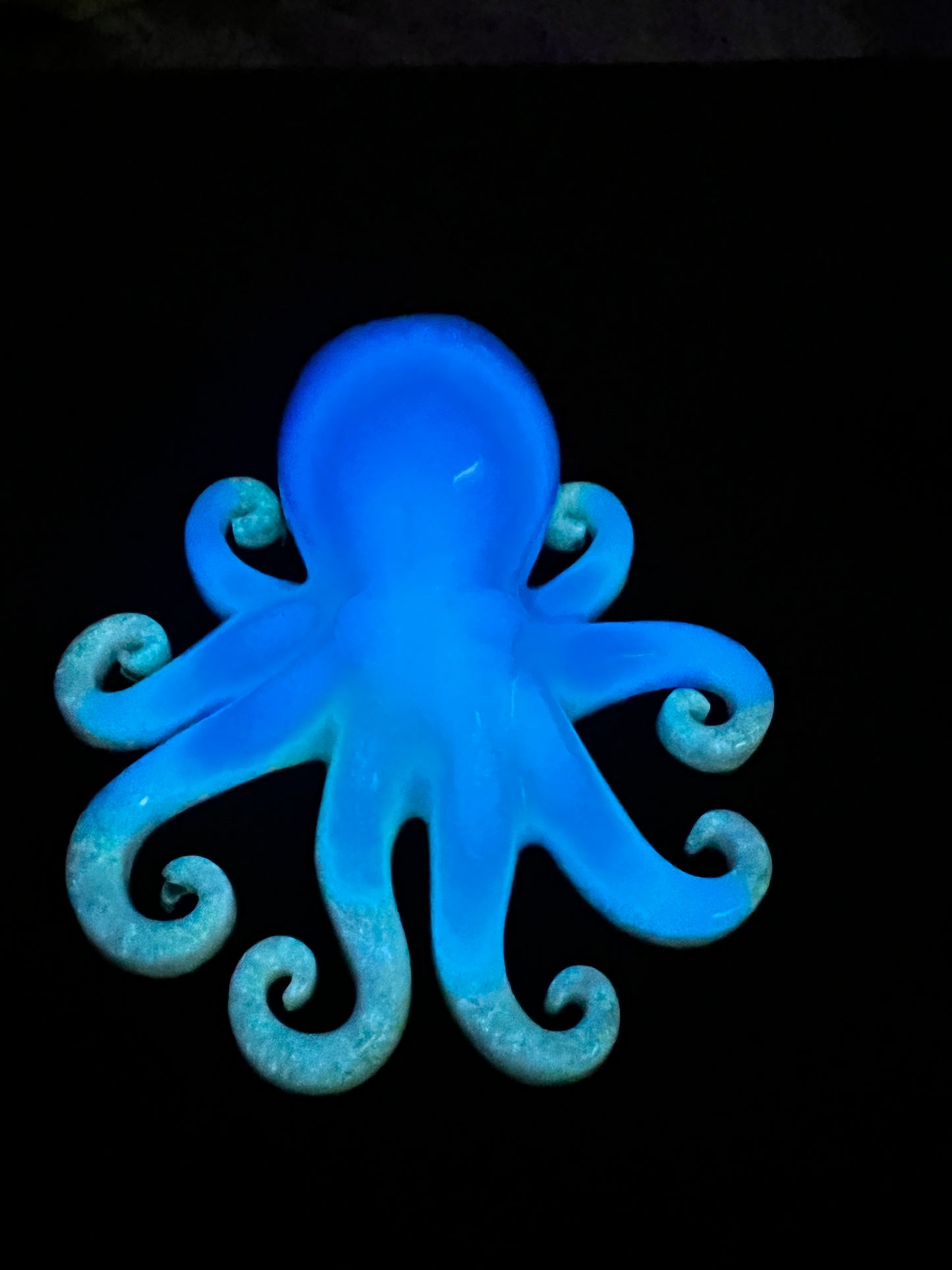 Glow in the dark resin octopus sculpture