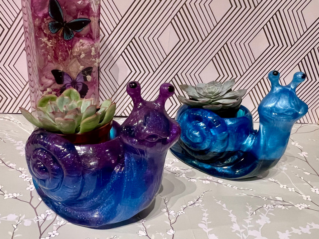 A beautiful resin Snail succulent pot