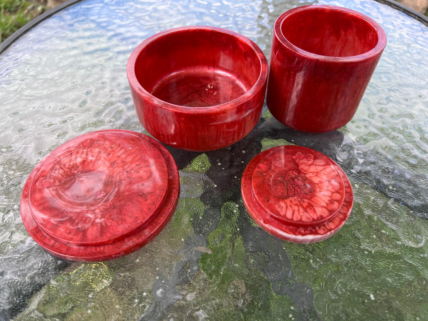 Red resin jar with floral accent