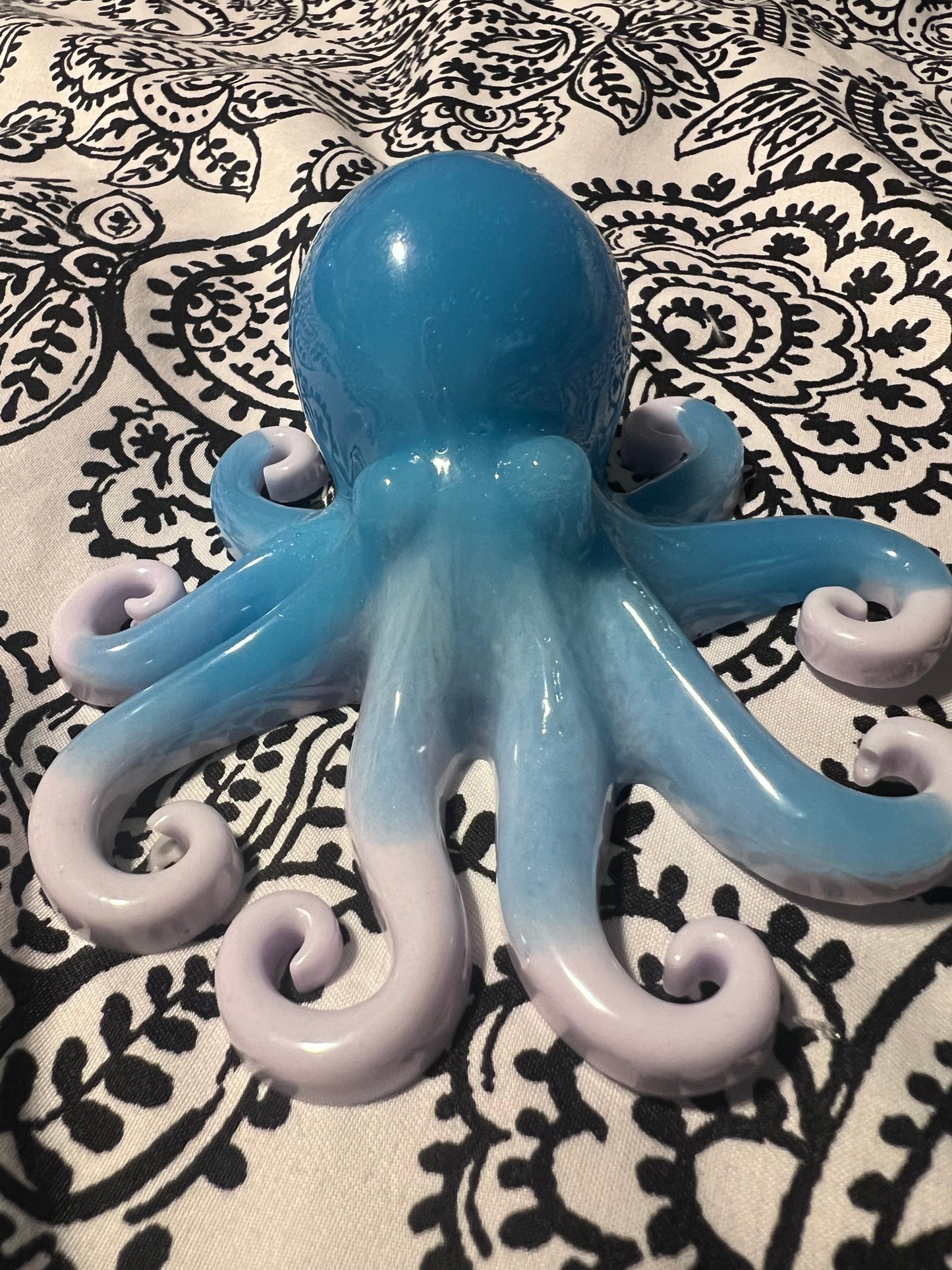 Glow in the dark resin octopus sculpture