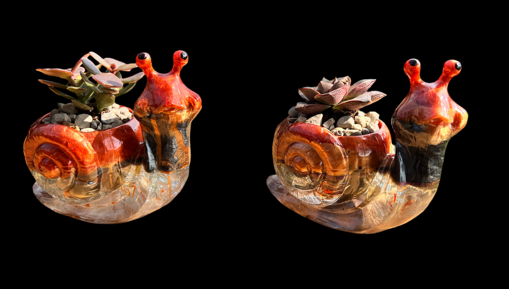 A beautiful resin Snail succulent pot