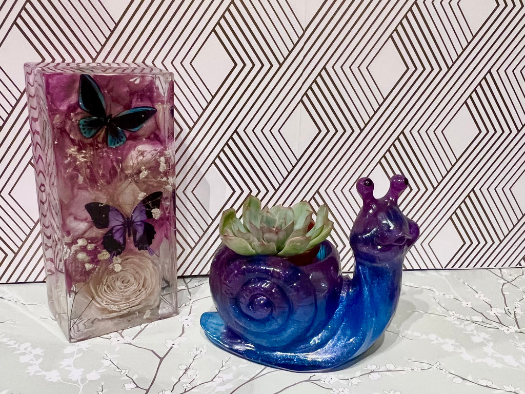 A beautiful resin Snail succulent pot