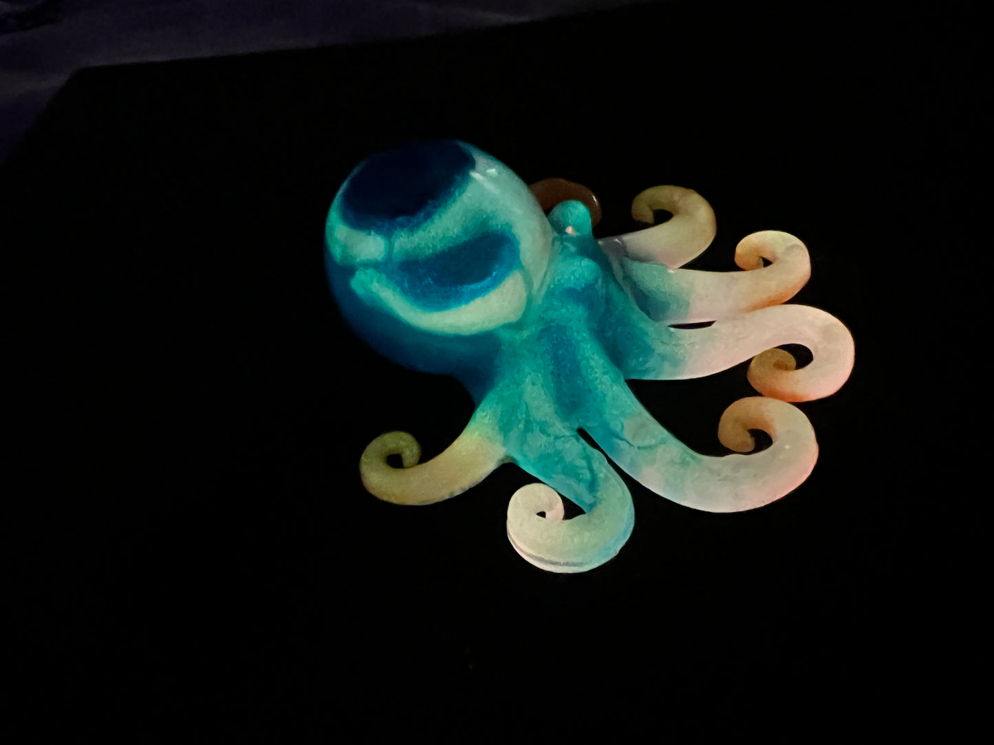 Glow in the dark resin octopus sculpture