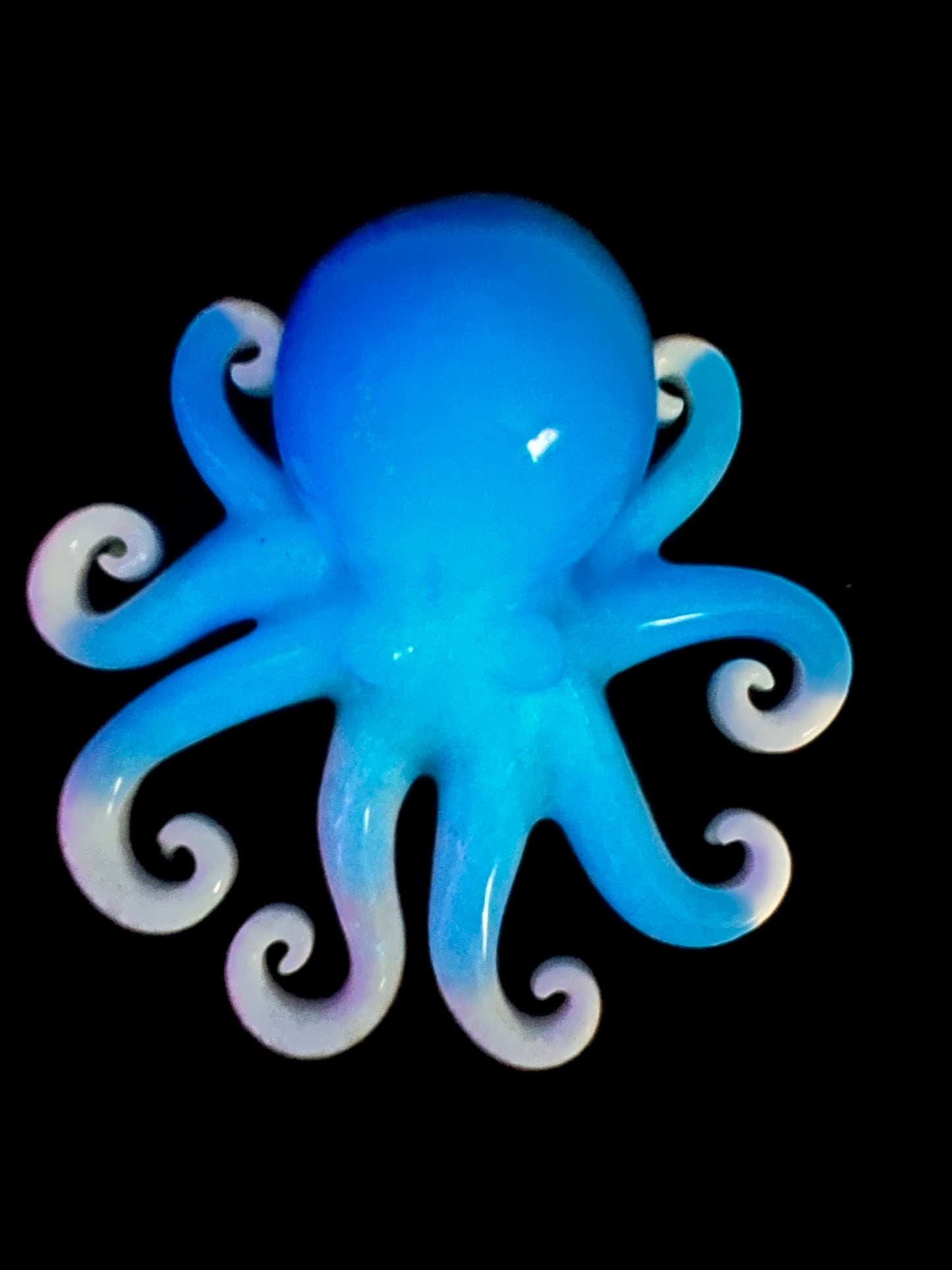 Glow in the dark resin octopus sculpture