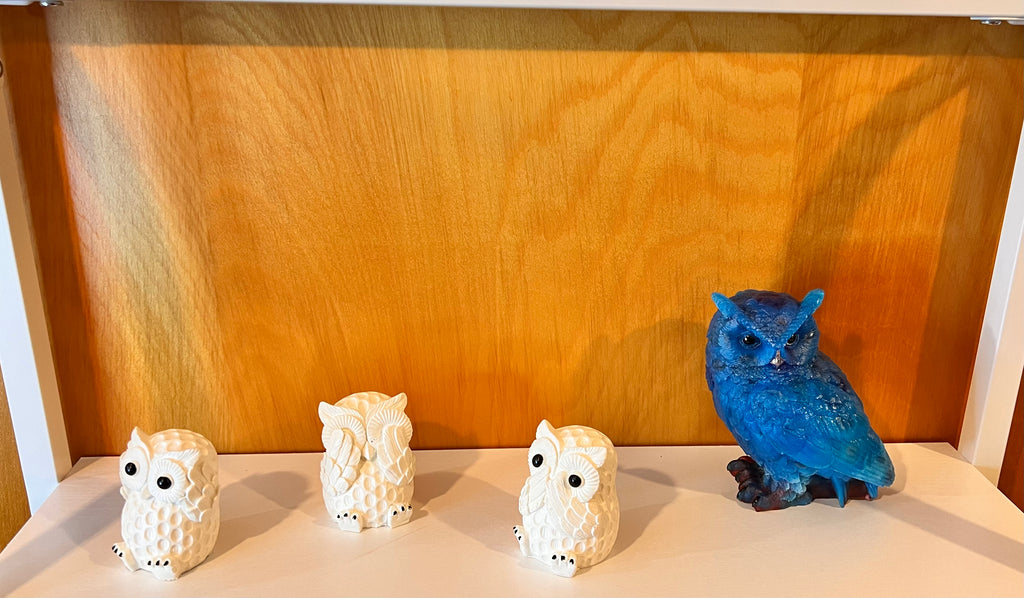 A Royal blue weighted resin owl statue
